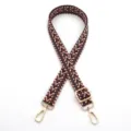 Detailed view of adjustable woven bag strap with purple chevron pattern and gold clips - Pink Green (Style 11)