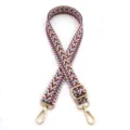 Macro view of the woven chevron patterned adjustable bag strap with gold hardware buckle - Light Blue Wine Red (Style 18)
