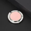 Detail of a circular folding purse hook with a pink glitter finish for table sides. - Pink (Glitter)