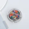 Detailed view of portable foldable table bag hook featuring a colorful floral Happy design - Happy Floral Style (款式1)