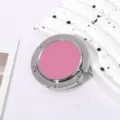 Gedetailleerde weergave van de inklapbare roze tassenhaak met zilveren metalen rand - Enkele Haak Opvouwbare Stijl / Rozerood