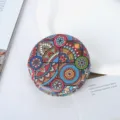 Detailed view of the vibrant Bohemian pattern on a round PU leather pocket mirror - Mandala Pattern Style 5 / 7cm Diameter