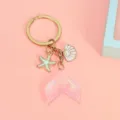 Dreamy pink gradient mermaid tail keychain with glitter starfish and shell charms - Pink Gradient Tail (With Pearl Shell & Starfish) / Pink 9