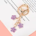 Delicate purple enamel cherry blossom keychain with gold-toned metal clasp and ring - Lobster Clasp Style / Purple