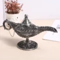 Antique silver Aladdin magic lamp with ornate embossed floral patterns on a wooden tabletop - Medium (12.5cm) / Antique Pewter Electroplated (Classic Magic Lamp)