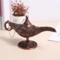 Macro view of vintage copper Aladdin lamp with intricate floral embossing for home decor - Medium (12.5cm) / Antique Red Copper Electroplated (Classic Magic Lamp)