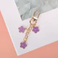 Charming purple enamel triple flower keychain with golden metal chain for bag accessories - Purple G-clasp With Chain