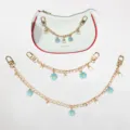 Gouden metalen tassenketting met imitatieparels en blauwe madeliefjes hangers. - 20cm / Blauw Madeliefje