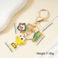 Football themed gold metal keychain featuring soccer ball trophy and cleat charms - Shield Trophy Style (003-B)