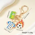 Creative football metal keychain featuring striped jersey and flaming soccer charms - Flame Football Style (001-B)