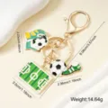 Metal soccer-themed keychain with ball, field, and shoe charms, a gift for fans - Glove Football Style (002-A)