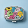 Compact square pill box with colorful monster pattern for jewelry or medicine storage - Monster Cat (Square Silver Frame)