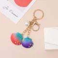 Creative resin shell keychain with gradient colors and pearl charm for bags and gifts - Seashell Keychain / Watermelon Red and Purple Combination