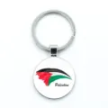Detailed macro view of a circular metal keychain featuring the Palestinian flag design. - Artistic Brushstroke Style (5-玻璃款) / Glass Style