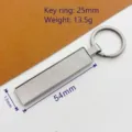 Portachiavi rettangolare in metallo argento 54x13mm, anello 25mm, peso di 13,5g - Modello liscio canna di fucile (stile 16)