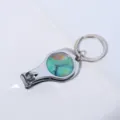 Metalen nagelknipper sleutelhanger met een unieke groene marmeren decoratieve inlay - Ronde Stijl 4