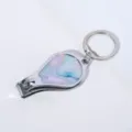 Draagbare nagelknipper-sleutelhanger met levendig marmerpatroon op zilver metaal - Waterdruppel Stijl 2