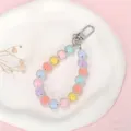 Handgemaakte telefoonriem en sleutelhanger met kleurrijke macaron kralen en zilver - Macaron Kralenketting