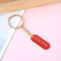 Red metal inspirational keychain with Have a Bright Future gold engraving for student gifts - Oval Bright Future