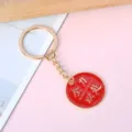 Red and gold inspirational keychain with "Go To All Lengths" engraved pendant - Circle Go to All Lengths