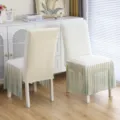 Detail view of the quilted elastic chair cover with gradient green mesh ruffle skirt. - One Size / Princess Style Green