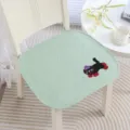 Light green chair cushion detail showing cute cat embroidery, non-slip design for home and office. - Cute Plush Green Padded Anti-slip