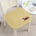 Close-up of the embroidered puppy pattern and soft textured surface of the chair cushion. - Dotted Dog Yellow Padded Anti-slip