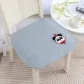 Close-up detail of thick chair cushion with cute panda embroidery and soft textured fabric. - Panda Blue Padded Anti-slip