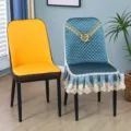 Detailed view of luxury quilted dining chair cover with floral lace skirt, elegant home decor. - Curved Chair Cover / Single Piece / Blue