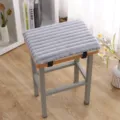 Grey thick plush stool cushion detail, soft ribbed texture with secure straps for indoor chairs. - 35CM*25CM / Horizontal Stripe Rabbit Plush Gray
