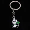 High-quality detail shot of a cute panda metal keychain with green bamboo enamel charm - 熊猫14款式