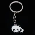 Close-up detail of a cute cartoon panda metal keychain with silver ring and chain - 熊猫07款式