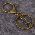 Antik-Messing Karabinerverschluss mit flachem Schlüsselring für DIY Schmuck - 古青铜加4节链条款