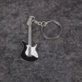 Detailed view of a miniature black and white electric guitar keychain pendant - Black