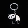 Grote creatieve metalen panda sleutelhanger met een zwart-witte emaille afwerking - Lopende Panda Pose