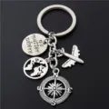 Zilveren reissleutelhanger met vliegtuig wereldkaart en kompas bedels quote hanger - Reisavontuur Gids (12)