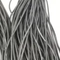 Close-up macro shot of black waxed necklace cord for DIY jewelry making and pendants - Glossy Leather Cord / 1.8mm / Black