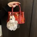 Bolso tote de PVC rojo transparente con estuche interno y dije de perro de peluche - Con Colgante / Rojo