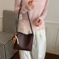Handmade dark brown woven leather shoulder bag with colorful wooden bead tassel - Coffee With Rabbit Pendant