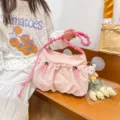 Trendy pink canvas drawstring messenger bag for women with ruffled shoulder strap - Pink