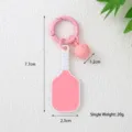 Dimensions détaillées du porte-clés raquette de pickleball rose avec breloque balle - Rose