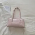 Elegante Vintage Bowling-Handtasche in Hellrosa mit strukturierter Kunstleder-Oberfläche - Einzelne Tasche / Rosa