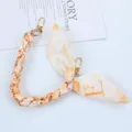 Detail of short phone strap chain with interwoven orange letter print silk scarf - Style E