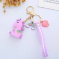 Purple unicorn keychain with rainbow and shell charms and a matching purple strap - Wing Integrated Style / Purple