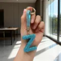 Sparkling luxury blue rhinestone-encrusted letter Z keychain with matching leather strap - Letter Z