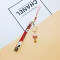 Japanese lucky cat fabric phone strap with hollow sakura charm and gold bell pendant - Independent OPP Bag Packaging / Red