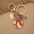 Portachiavi in metallo artigianale con graziosi ciondoli a forma di coniglio e carpa koi - Pezzo Singolo / Fiore Rosa Coniglio Pesce Nero