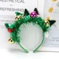 Close-up of Christmas LED headband with green tinsel and colorful metallic balls - Feather Silk Christmas Ball Headband (RL569-1)