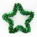 Detail of green metallic tinsel star hanging Christmas decoration with gold loop - Green