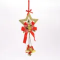 Detailed view of gold Christmas star ornament with angel, red bows and hanging bells - Pentagram Charm / 14cm / Gold